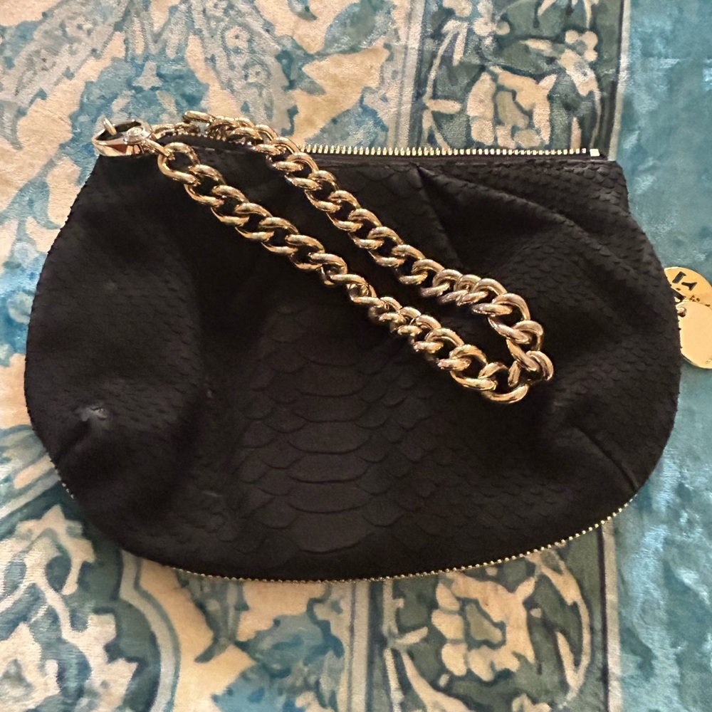NOT FOR SALE Henri Bendel black and gold clutch/wristlet